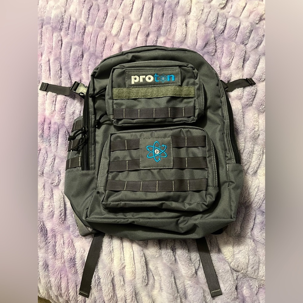 Gray Proton pickleball Backpack with Blue Logo
